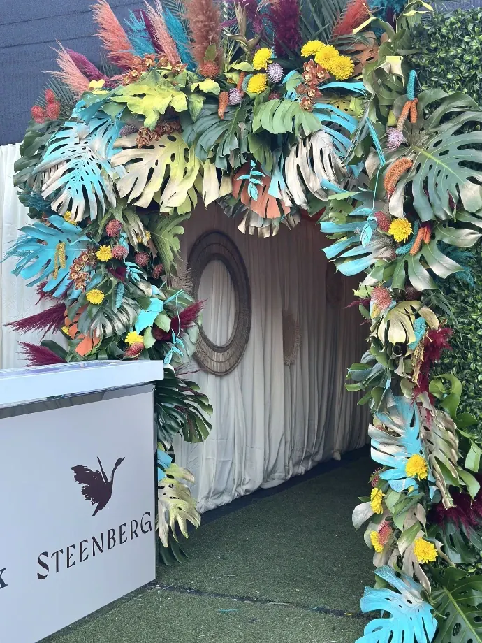 Tropical floral arch built for a brand activation
