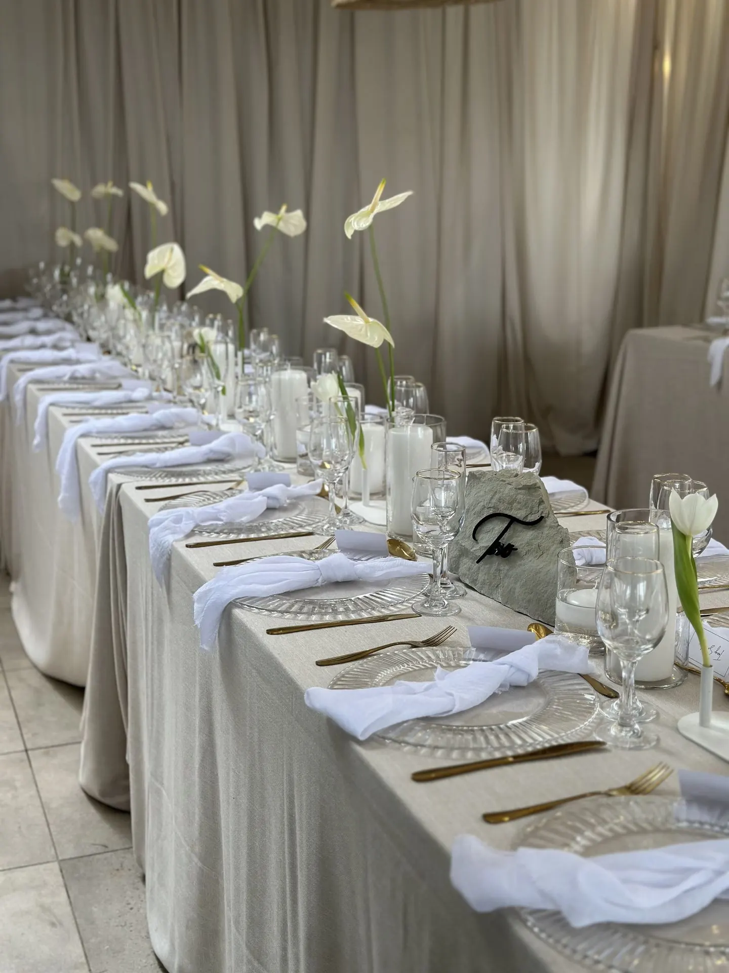 Draped white wedding table with glassware, Durban